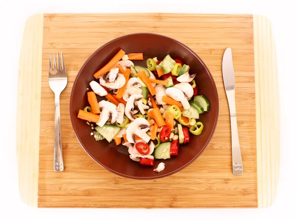 Mistura de legumes em placa com faca e garfo — Fotografia de Stock