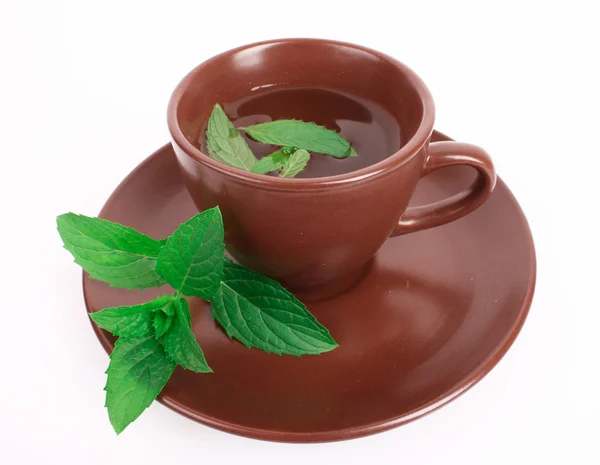 stock image Cup of green tea on the saucer with mint isolated on white