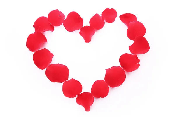 Rose petals in heart symbol isolated on white — Stock Photo, Image