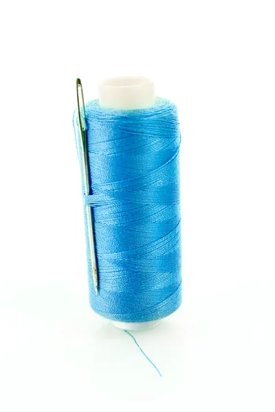 Blue Bobbin with needle isolated on white — Stock Photo, Image
