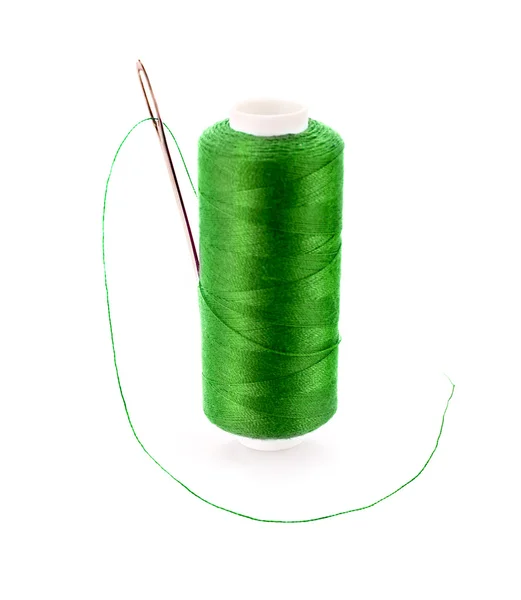 Green Bobbin with needle isolated on white — Stock Photo, Image