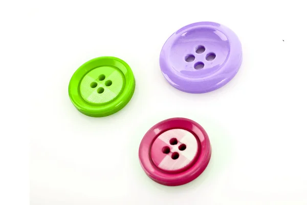 Três botões isolados em branco — Fotografia de Stock