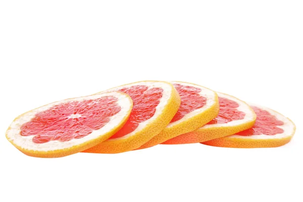 Elszigetelt fehér rózsaszín grapefruit szeletek — Stock Fotó