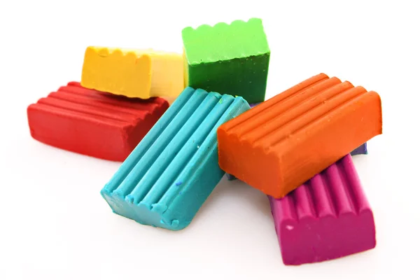Childen bright multicoloured plasticine set chaotically isolated — Stock Photo, Image