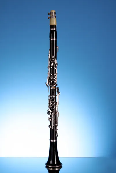 Clarinet on blue background — Stock Photo, Image