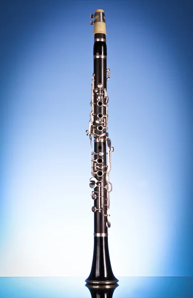 Clarinet on blue background — Stock Photo, Image