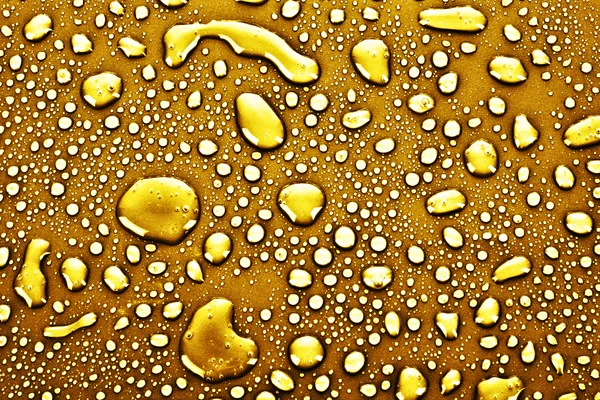 Oro gocce d'acqua sfondo — Foto Stock