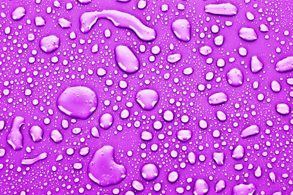 Picături de apă roz fundal — Fotografie, imagine de stoc