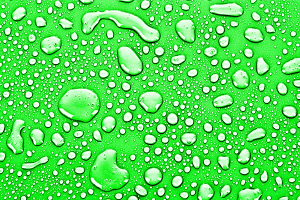 Green water drops background — Stock Photo, Image