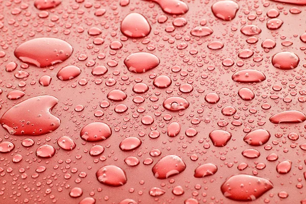 Červená voda klesne pozadí — Stock fotografie
