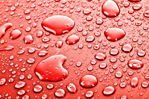 Rött vatten droppar bakgrund — Stockfoto