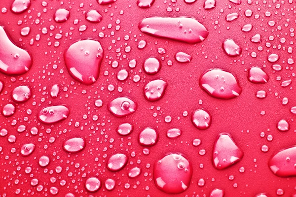 Red water drops background — Stock Photo, Image