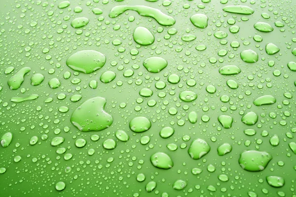 Grön vatten droppar bakgrund — Stockfoto