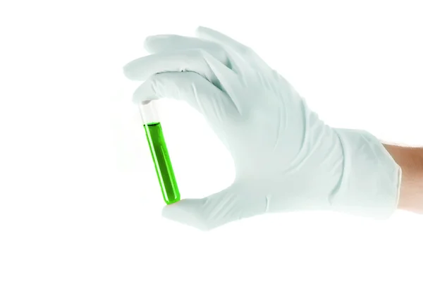 Guante de mano del médico con tubo de ensayo con líquido aislado en —  Fotos de Stock
