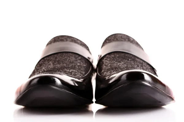 Black shiny man 's shoe isolated on white — стоковое фото