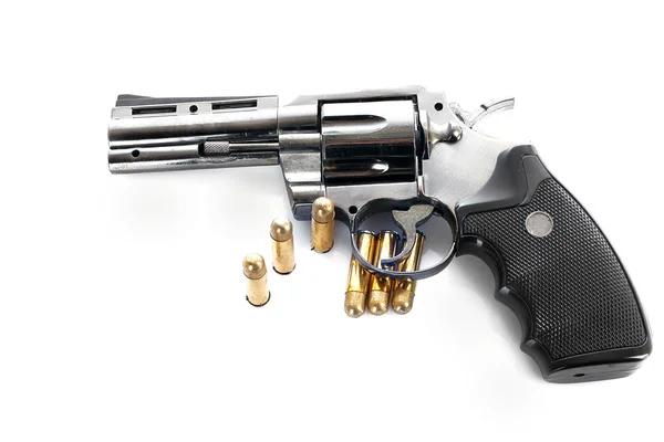 Felsorolásjelek és revolver. Nem igazi fegyver (öngyújtó) — Stock Fotó