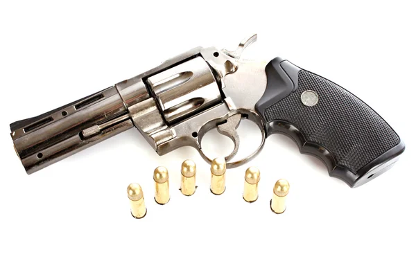 Bullets and revolver. Not real gun (lighter) — Stock Photo, Image