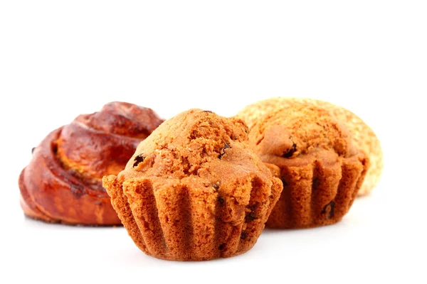Loaf with raisins and muffin isolated on white — Stock Photo, Image