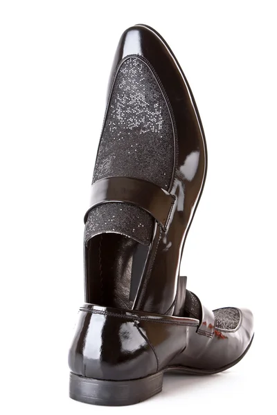 Black shiny man 's shoe isolated on white — стоковое фото