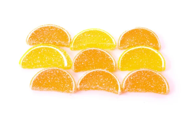 Few sliced lemon fruit jelly isolated on white — Stock Photo, Image