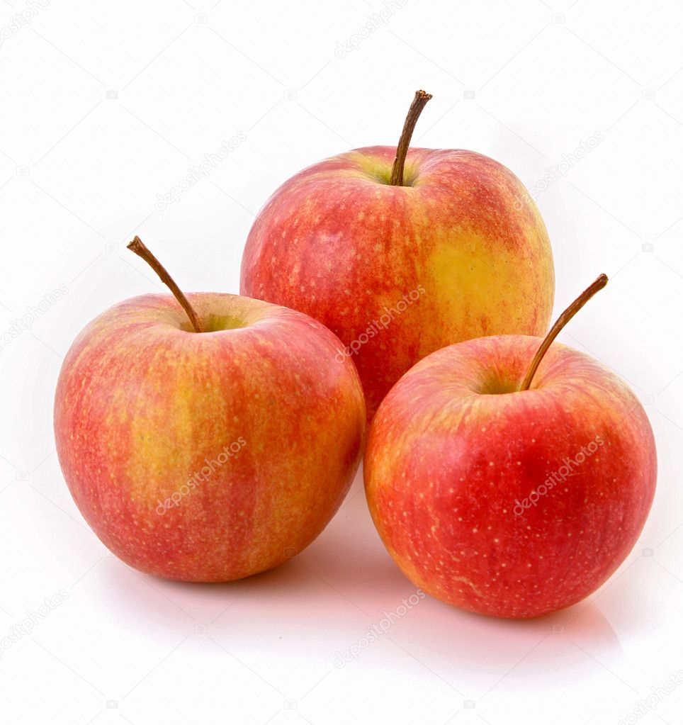 Few ripe red apples isolated on white