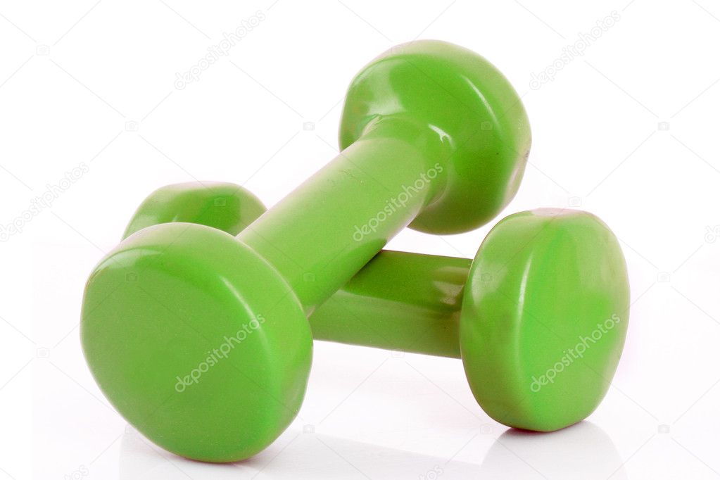 Couple of green dumbbells isolated on white