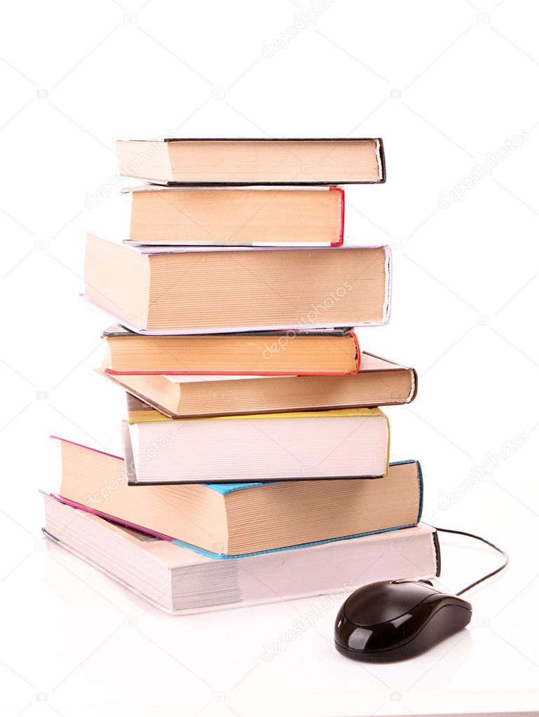 Hard cover books and computer mouse isolated on white