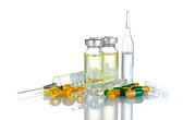 Medical ampoules, syringe and pills