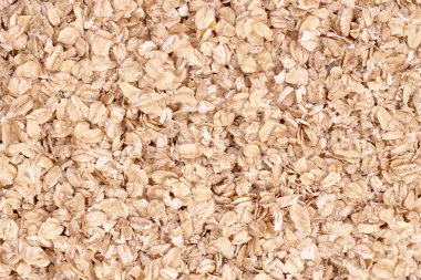 Uncoocked rolled oats as texture clipart