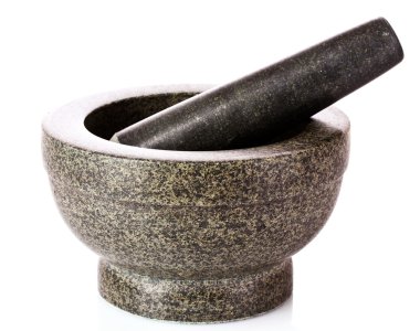 Stone pestle and mortar over a white background clipart