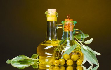 Olive oil in jar and olives clipart