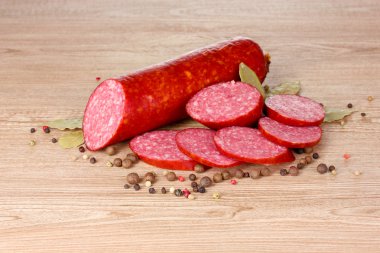 Tasty sausage and spices clipart