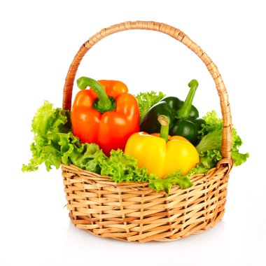 A set of vegetables in wricker basket isolated on white clipart