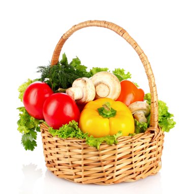 A set of vegetables in wricker basket isolated on white clipart