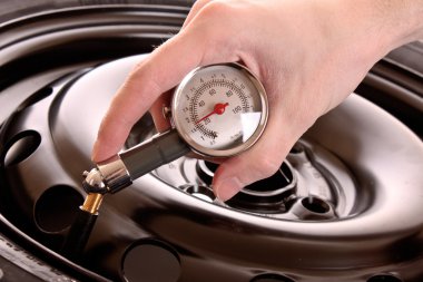 Checking pressure in tyre clipart