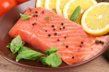 Salmon with lemon and basil clipart