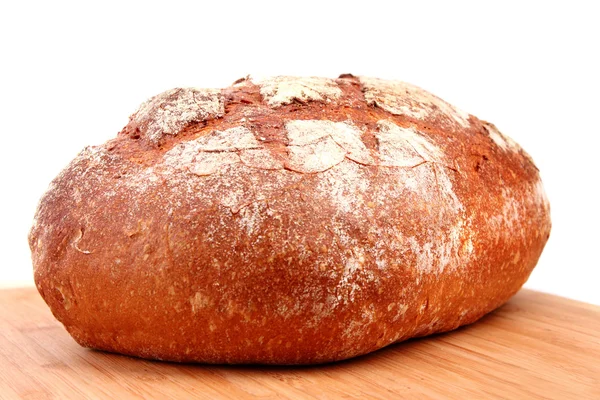 Хлеб на деревянной поверхности — стоковое фото