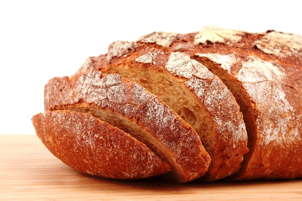 Хліб на дерев'яній поверхні — стокове фото