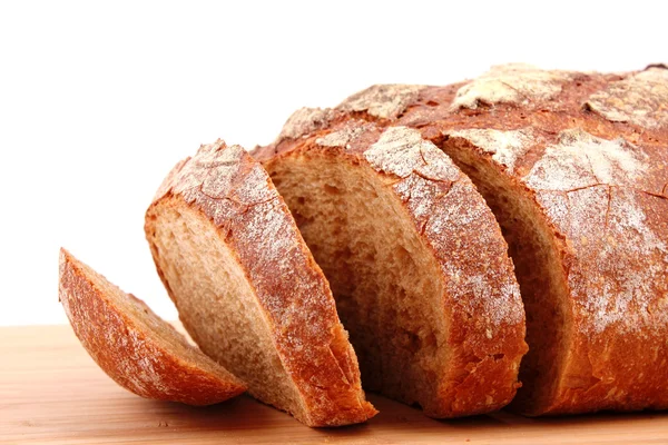 Хлеб на деревянной поверхности — стоковое фото