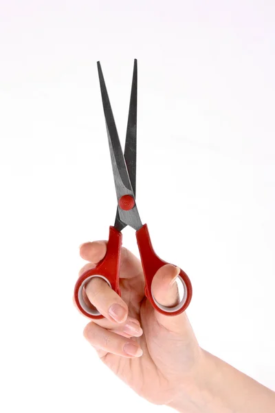 Nůžky v ruce izolovaných na bílém pozadí — Stock fotografie