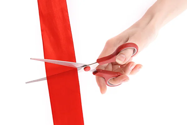 Red ribbon, scissors and hand isolated on white — Stock Photo, Image