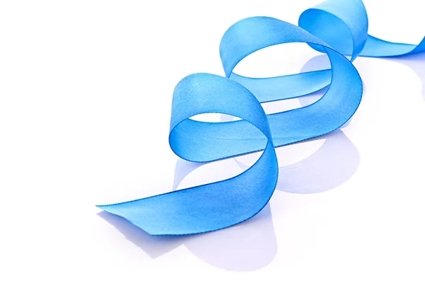 Blue textile ribbon isolated on white — Zdjęcie stockowe