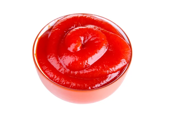 Velsmagende ketchup i skål isoleret på hvid - Stock-foto