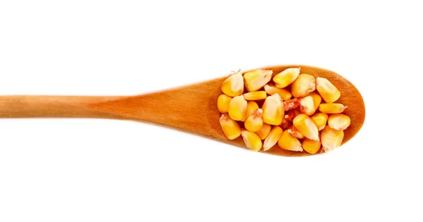 Кукуруза в ложке изолированы на белом — стоковое фото