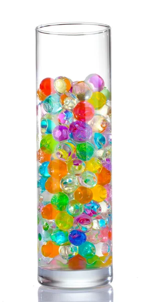 Bolas de color en jarrón de vidrio aislado en blanco — Foto de Stock
