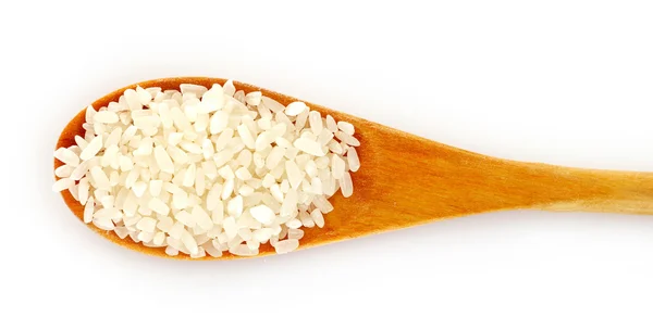 Reis im Löffel isoliert auf weiß — Stockfoto