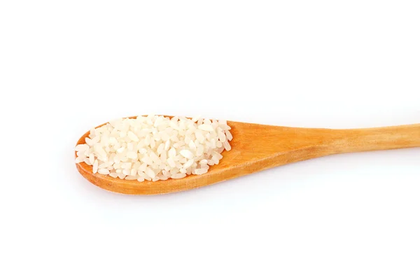 Rijst in lepel geïsoleerd op wit — Stockfoto