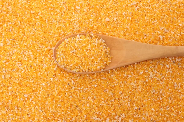 Maïs grutten en lepel — Stockfoto