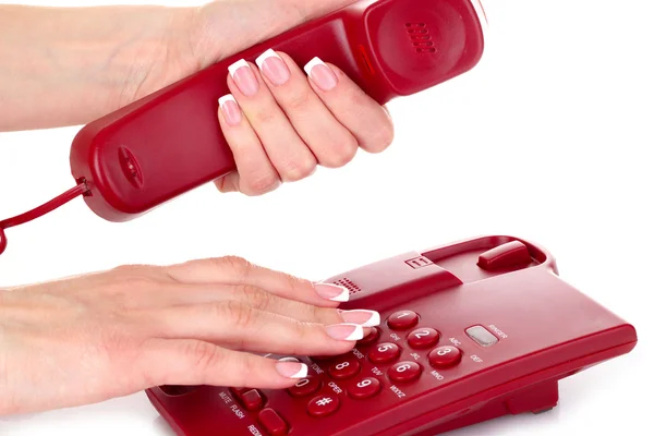 Marcando en el teléfono rojo —  Fotos de Stock