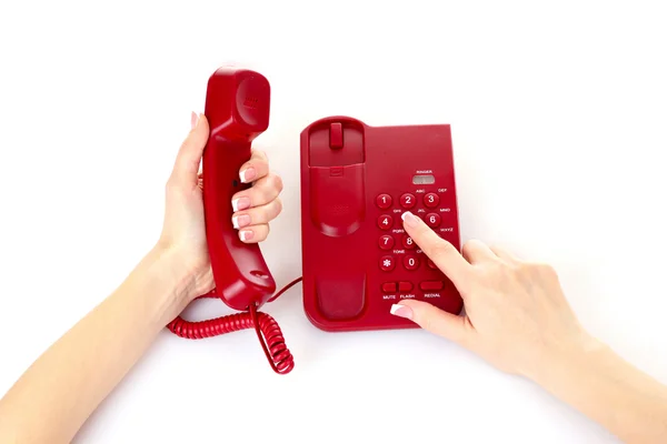 Dialing on the red phone — Stock Photo, Image